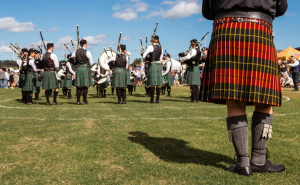 Traditional Scottish kilts displaying tartan patterns, symbolizing Scottish clan ancestors and genealogy.